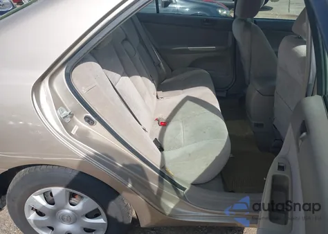 2003 Toyota Camry Le from USA, damaged, VIN 4T1BE32K93U729701